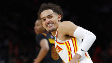 ATLANTA, GA - MARCH 31: Trae Young #11 of the Atlanta Hawks reacts during the second half against the Cleveland Cavaliers at State Farm Arena on March 31, 2022 in Atlanta, Georgia. NOTE TO USER: User expressly acknowledges and agrees that, by downloading and or using this photograph, User is consenting to the terms and conditions of the Getty Images License Agreement. (Photo by Todd Kirkland/Getty Images)