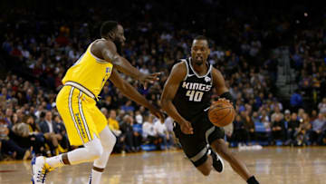 OAKLAND, CA - FEBRUARY 21: Harrison Barnes #40 of the Sacramento Kings drives to the basket against Draymond Green #23 of the Golden State Warriors at ORACLE Arena on February 21, 2019 in Oakland, California. NOTE TO USER: User expressly acknowledges and agrees that, by downloading and or using this photograph, User is consenting to the terms and conditions of the Getty Images License Agreement. (Photo by Lachlan Cunningham/Getty Images)