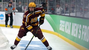 BOSTON, MASSACHUSETTS - APRIL 07: Aaron Huglen #7 of the Minnesota Gophers skates against the Minnesota State Mavericks during the second period of the Frozen Four semifinal at TD Garden on April 07, 2022 in Boston, Massachusetts. (Photo by Maddie Meyer/Getty Images)
