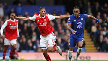 LONDON, ENGLAND - NOVEMBER 06: William Saliba of Arsenal is challenged by Pierre-Emerick Aubameyang of Chelsea during the Premier League match between Chelsea FC and Arsenal FC at Stamford Bridge on November 06, 2022 in London, England. (Photo by Ryan Pierse/Getty Images)