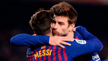 Barcelona's Argentinian forward Lionel Messi (L) celebrates with Barcelona's Spanish defender Gerard Pique after scoring a goal during the Spanish League football match between Barcelona and Leganes at the Camp Nou stadium in Barcelona on January 20, 2019. (Photo by Josep LAGO / AFP) (Photo credit should read JOSEP LAGO/AFP/Getty Images)