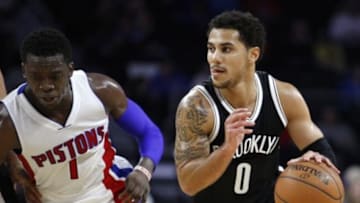Oct 8, 2015; Auburn Hills, MI, USA; Brooklyn Nets guard Shane Larkin (0) dribbles the ball past Detroit Pistons guard Reggie Jackson (1) during the third quarter at The Palace of Auburn Hills. The Nets won 93-83. Mandatory Credit: Raj Mehta-USA TODAY Sports