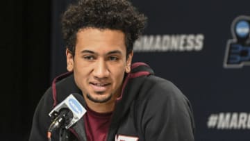 Mar 17, 2022; Milwaukee, WI, USA; Virgina Tech Hokies forward Keve Aluma answers questions during practice before the first round of the 2022 NCAA Tournament at Fiserv Forum. Mandatory Credit: Benny Sieu-USA TODAY Sports