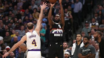 DENVER, COLORADO - DECEMBER 03: Will Barton III #5 of the Denver Nuggets puts up a shot against Alex Caruso #4 of the Los Angeles Lakers in the fourth quarter at Pepsi Center on December 03, 2019 in Denver, Colorado. NOTE TO USER: User expressly acknowledges and agrees that, by downloading and or using this photograph, User is consenting to the terms and conditions of the Getty Images License Agreement. (Photo by Matthew Stockman/Getty Images)