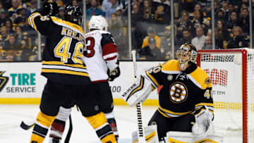 BOSTON, MA - FEBRUARY 28: Boston Bruins goalie Tuukka Rask (40) makes a glove save as Boston Bruins center David Krejci (46) ties up Arizona Coyotes defenseman Alex Goligoski (33) during a regular season game between the Boston Bruins and the Arizona Coyotes on February 28, 2017 at TD Garden in Boston, Massachusetts The Bruins defeated the Coyotes 4-1. (Photo by Fred Kfoury III/Icon Sportswire via Getty Images)