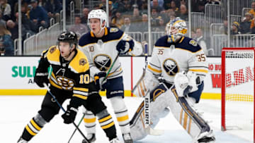 BOSTON, MA - NOVEMBER 21: Boston Bruins right wing Anders Bjork (10) tries to set up in front of Buffalo Sabres defenseman Henri Jokiharju (10) and Buffalo Sabres goalie Linus Ullmark (35) during a game between the Boston Bruins and the Buffalo Sabres on November 21, 2019, at TD Garden in Boston, Massachusetts. (Photo by Fred Kfoury III/Icon Sportswire via Getty Images)