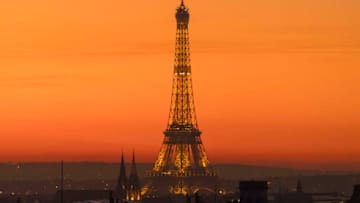 PARIS, FRANCE - DECEMBER 30: Eiffel Tower during sunset on December 30, 2019 in Paris, France. The Eiffel Tower constructed from 1887 to 1889 as the entrance to the 1889 World's Fair.The Eiffel Tower is the most-visited paid monument in the world 6.91 million people ascended it in 2015. The tower is 324 metres and is the tallest structure in Paris. Its base is square, measuring 125 metres on each side. It was the first structure to reach a height of 300 metres. The Eiffel Tower is the second tallest free-standing structure in France after the Millau Viaduct. The tower has three levels for visitors, with restaurants on the first and second levels. The top level's upper platform is 276 m above the ground. (Photo by Athanasios Gioumpasis/Getty Images)