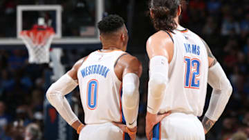OKLAHOMA CITY, OK- APRIL 5: Russell Westbrook #0 and Steven Adams #12 of the Oklahoma City Thunder look on against the Detroit Pistons on April 5, 2019 at Chesapeake Energy Arena in Oklahoma City, Oklahoma. NOTE TO USER: User expressly acknowledges and agrees that, by downloading and or using this photograph, User is consenting to the terms and conditions of the Getty Images License Agreement. Mandatory Copyright Notice: Copyright 2019 NBAE (Photo by Zach Beeker/NBAE via Getty Images)