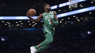 NEW YORK, NY - NOVEMBER 14: Jaylen Brown #7 of the Boston Celtics dunks the ball during the first half of the NBA game against the Brooklyn Nets at Barclays Center on November 14, 2017 in the Brooklyn Borough of New York City. NOTE TO USER: User expressly acknowledges and agrees that, by downloading and or using this photograph, User is consenting to the terms and conditions of the Getty Images License Agreement. (Photo by Matteo Marchi/Getty Images)