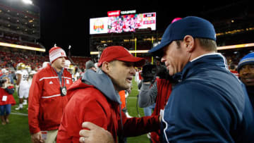 SANTA CLARA, CA - DECEMBER 26: Nebraska Cornhuskers head coach Mike Riley shakes hands with head coach Jim Mora of the UCLA Bruins after the Cornhuskers beat the UCLA Bruins in the Foster Farms Bowl at Levi's Stadium on December 26, 2015 in Santa Clara, California. (Photo by Ezra Shaw/Getty Images)