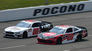 LONG POND, PENNSYLVANIA - JUNE 01: Christopher Bell, driver of the #20 Rheem Toyota, races Cole Custer, driver of the #00 FIMS Manufacturing Ford, during the NASCAR Xfinity Series Pocono Green 250 at Pocono Raceway on June 01, 2019 in Long Pond, Pennsylvania. (Photo by Jared C. Tilton/Getty Images)
