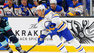 Oct 25, 2022; Seattle, Washington, USA; Buffalo Sabres right wing Kyle Okposo (21) skates with the puck against the Seattle Kraken during the third period at Climate Pledge Arena. Mandatory Credit: Joe Nicholson-USA TODAY Sports