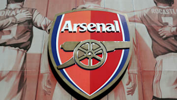 LONDON, ENGLAND - MARCH 29: The Arsenal badge can be seen on the side of the Emirates stadium, home of Arsenal FC, on the side of a building on March 29, 2021 in London, England. (Photo by Chloe Knott - Danehouse/Getty Images)