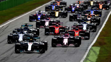 MONZA, ITALY - SEPTEMBER 03: Lewis Hamilton of Great Britain driving the (44) Mercedes AMG Petronas F1 Team Mercedes F1 WO8 leads the field into the first corner at the start during the Formula One Grand Prix of Italy at Autodromo di Monza on September 3, 2017 in Monza, Italy. (Photo by Dan Istitene/Getty Images)