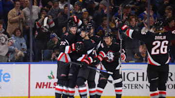 Dec 4, 2022; Buffalo, New York, USA; Buffalo Sabres center Tage Thompson (72) celebrates his gaol with teammates during the first period against the San Jose Sharks at KeyBank Center. Mandatory Credit: Timothy T. Ludwig-USA TODAY Sports