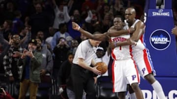 Apr 4, 2015; Auburn Hills, MI, USA; Detroit Pistons guard Reggie Jackson (1) and forward Anthony Tolliver (43) celebrate after the final buzzer against the Miami Heat at The Palace of Auburn Hills. Pistons beat the Heat 99-98. Mandatory Credit: Raj Mehta-USA TODAY Sports