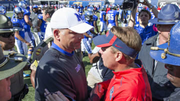 MEMPHIS, TN - OCTOBER 17: Head Coach Justin Fuente of the Memphis Tigers shakes hands after the game with Hugh Freeze of the Ole Miss Rebels at Liberty Bowl Memorial Stadium on October 17, 2015 in Memphis, Tennessee. The Tigers defeated the Rebels 37-24. (Photo by Wesley Hitt/Getty Images)