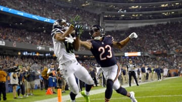 CHICAGO, IL - SEPTEMBER 17: Tyler Lockett #16 of the Seattle Seahawks receives a pass against Kyle Fuller #23 of the Chicago Bears for a touchdown in the fourth quarter at Soldier Field on September 17, 2018 in Chicago, Illinois. (Photo by Quinn Harris/Getty Images)