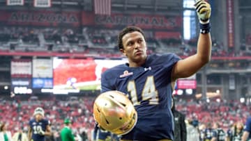 Jan 1, 2016; Glendale, AZ, USA; NNotre Dame Fighting Irish quarterback DeShone Kizer (14) leaves the field following the 2016 Fiesta Bowl at University of Phoenix Stadium. The Ohio State Buckeyes defeated Notre Dame 44-28. Mandatory Credit: Matt Cashore-USA TODAY Sports
