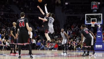 Oct 30, 2015; Auburn Hills, MI, USA; Chicago Bulls forward Pau Gasol (16) wins a jump ball over Detroit Pistons center Andre Drummond (0) during overtime at The Palace of Auburn Hills. Pistons win 98-94. Mandatory Credit: Raj Mehta-USA TODAY Sports