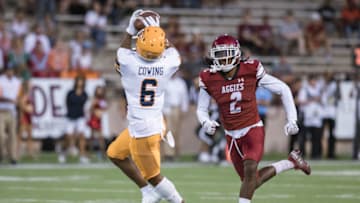 Jacob Cowing (6) receives the ball as the UTEP Miners face off against the New Mexico State Aggies at Aggie Memorial Stadium in Las Cruces on Saturday, Aug. 28, 2021.Nmsu Utep 7