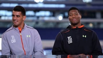 Feb 21, 2015; Indianapolis, IN, USA; Florida State quarterback Jameis Winston (right) and Oregon Ducks quarterback Marcus Mariota do an interview on the NFL Network after finishing their workout during the 2015 NFL Combine at Lucas Oil Stadium. Mandatory Credit: Brian Spurlock-USA TODAY Sports