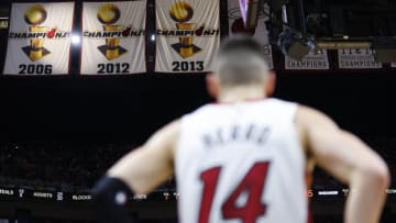 A general view of the Miami Heat NBA Championship banners as Tyler Herro #14 looks on(Photo by Michael Reaves/Getty Images)