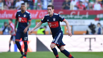 AUGSBURG, GERMANY - APRIL 07: Sebastian Rudy of Bayern Muenchen plays the ball during the Bundesliga match between FC Augsburg and FC Bayern Muenchen at WWK-Arena on April 7, 2018 in Augsburg, Germany. (Photo by Sebastian Widmann/Bongarts/Getty Images)