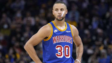SAN FRANCISCO, CALIFORNIA - NOVEMBER 08: Stephen Curry #30 of the Golden State Warriors looks on against the Atlanta Hawks during the first half of an NBA basketball game at Chase Center on November 08, 2021 in San Francisco, California. NOTE TO USER: User expressly acknowledges and agrees that, by downloading and or using this photograph, User is consenting to the terms and conditions of the Getty Images License Agreement. (Photo by Thearon W. Henderson/Getty Images)