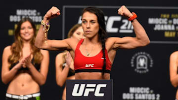 DALLAS, TX - MAY 12: UFC women's strawweight champion Joanna Jedrzejczyk of Poland poses on the scale during the UFC 211 weigh-in at the American Airlines Center on May 12, 2017 in Dallas, Texas. (Photo by Josh Hedges/Zuffa LLC/Zuffa LLC via Getty Images)