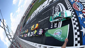 CHARLOTTE, NORTH CAROLINA - SEPTEMBER 29: William Byron, driver of the #24 UniFirst Chevrolet, lead the field to the green flag start of the Monster Energy NASCAR Cup Series Bank of America ROVAL 400 at Charlotte Motor Speedway on September 29, 2019 in Charlotte, North Carolina. (Photo by Brian Lawdermilk/Getty Images)