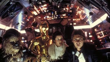 Harrison Ford as Han Solo, Carrie Fisher as Princess Leia, and Anthony Daniels as C-3PO in Star Wars: Episode V - The Empire Strikes Back (1980).. © Lucasfilm Ltd. & TM. All Rights Reserved.