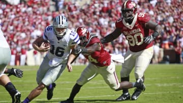 NORMAN, OK - OCTOBER 15: Quarterback Jesse Ertz #16 of the Kansas State Wildcats is grabbed by linebacker Emmanuel Beal #14 of the Oklahoma Sooners October 15, 2016 at Gaylord Family-Oklahoma Memorial Stadium in Norman, Oklahoma. Oklahoma defeated Kansas State 38-17. (Photo by Brett Deering/Getty Images)