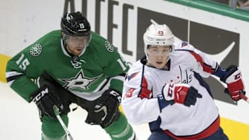 Feb 13, 2016; Dallas, TX, USA;Dallas Stars defenseman Patrik Nemeth (15) chases Washington Capitals right wing Stanislav Galiev (49) during the game at the American Airlines Center. The Stars defeat the Capitals 4-3. Mandatory Credit: Jerome Miron-USA TODAY Sports