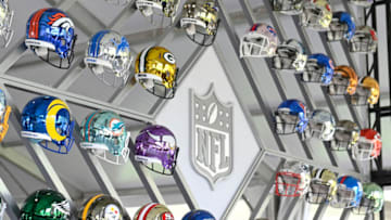 CLEVELAND, OHIO - APRIL 28: Wall of NFL team helmets on display inside the NFL Locker Room at the NFL Draft Experience on April 28, 2021 in Cleveland, Ohio. (Photo by Duane Prokop/Getty Images)