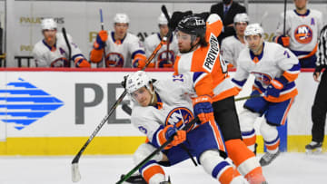 Mar 22, 2021; Philadelphia, Pennsylvania, USA; New York Islanders center Mathew Barzal (13) skates with the puck against Philadelphia Flyers defenseman Ivan Provorov (9) at Wells Fargo Center. Mandatory Credit: Eric Hartline-USA TODAY Sports