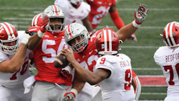 COLUMBUS, OH - NOVEMBER 21: Tyler Friday #54 of the Ohio State Buckeyes and Tommy Togiai #72 of the Ohio State Buckeyes pressure the quarterback against the Indiana Hoosiers at Ohio Stadium on November 21, 2020 in Columbus, Ohio. (Photo by Jamie Sabau/Getty Images)