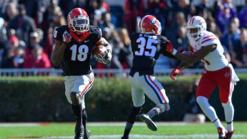 Nov 19, 2016; Athens, GA, USA; Georgia Bulldogs cornerback Deandre Baker (18) returns an interception against the Louisiana-Lafayette Ragin Cajuns during the first quarter at Sanford Stadium. Mandatory Credit: Dale Zanine-USA TODAY Sports
