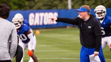 Florida Gators defensive coordinator Austin Armstrong talks to his players while running drills Saturday. The University of Florida held their first day of the 2023 Football Spring Practice Saturday March 4, 2023.[Doug Engle/Gainesville Sun]2023Gai Uffootballspring