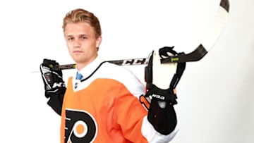 DALLAS, TX - JUNE 23: Adam Ginning poses after being selected 50th overall by the Philadelphia Flyers during the 2018 NHL Draft at American Airlines Center on June 23, 2018 in Dallas, Texas. (Photo by Tom Pennington/Getty Images)