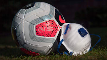 A Premier League Match Ball with a Protective Face Mask