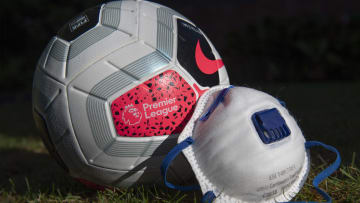 A Premier League Match Ball with a Protective Face Mask