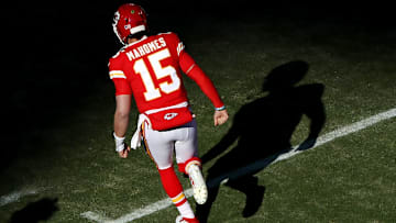 Chiefs quarterback Patrick Mahomes runs onto field for the AFC Championship against the Titans.