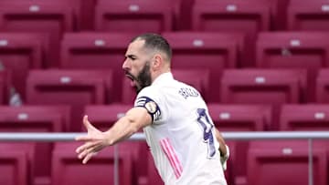 Karim Benzema célèbre son but inscrit en fin de match contre l'Atlético Madrid.