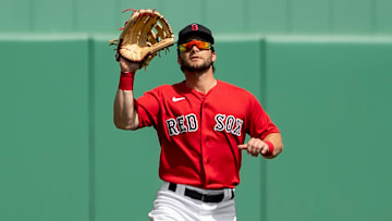 Red Sox outfielder Andrew Benintendi tracking down a fly ball in Spring Training 