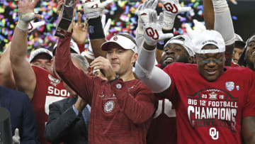 Lincoln Riley celebrates inside AT&T Stadium after winning the Big 12 Championship