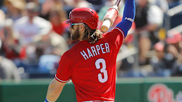 Phillies star Bryce Harper taking some hacks in a Spring Training game vs. the Red Sox
