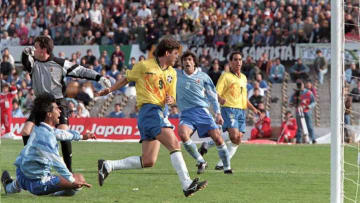 Brazilian soccer player Tulio (C) scores Brazil's