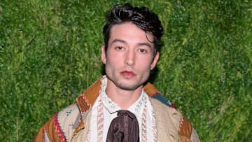 Ezra Miller under fire after video of him choking a fan circulates.