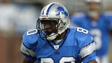 Charles Rogers carries the ball 